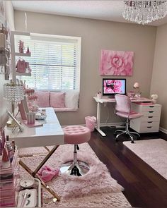 a bedroom with pink furniture and accessories in it's decorating style, including a desk