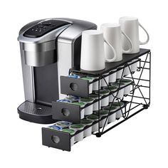 an automatic coffee maker with six cups on it