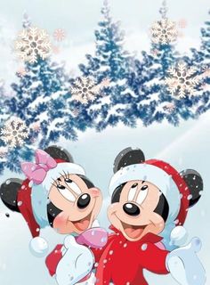 two mickey and minnie mouses in the snow