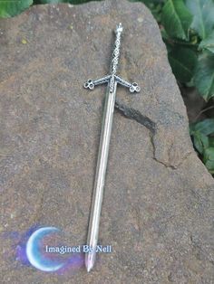 Celtic Sword Hair Pin For all the modern day warriors ♥️ The perfect compliment to your Witchy and Gothic aesthetic! Can also be used as a letter opener, bookmark, or altar decor.  Each hair pin is six (6) inches long in total. The pin, itself is five (5) inches. The Triple Moon Goddess emblem is one (1) inch long and two and a half (2.5) inches wide. It weighs approx 6 grams. Its lightweight and is comfortable to wear. Made from a Zinc Alloy. Nickel and Lead free *Note. It is shorter than some Warrior Hair, Witchy Hair, Gothic Hair, Celtic Hair, Gothic Hairstyles, Triple Moon Goddess, Viking Hair, Painted Hats, Beard Tattoo