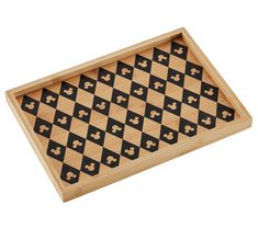 a wooden checker board with black and white squares