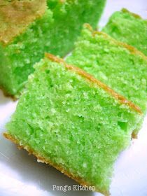 three pieces of green cake sitting on top of a white plate