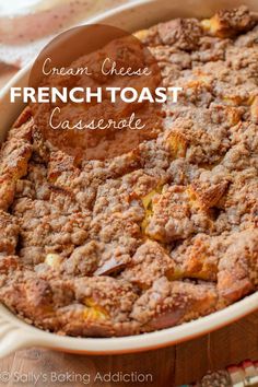 a close up of a casserole in a pan on a table with the words cream cheese french toast casserole