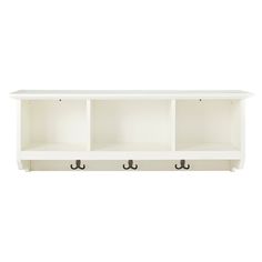 a white shelf with three hooks on the bottom and two open shelves below it, against a