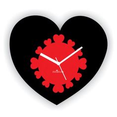 a heart shaped clock with red and black designs