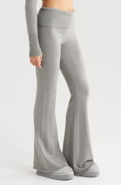 A ribbed fold-over waistband brings cozy energy to these cotton-blend leggings with flared hems. 33 1/2" inseam; 26" leg opening; 10 1/2" front rise; 12" back rise (size Medium) Pull-on style 48% cotton, 31% polyester, 15% polyamide, 6% viscose Machine wash, tumble dry Imported Foldover Flare Leggings, Styling Leggings Winter, Flare Bottoms For Fall Loungewear, Wide Leg Relaxed Fit Leggings For Loungewear, Relaxed Fit Wide Leg Leggings For Loungewear, Solid Flare Yoga Pants For Loungewear, Full Length Yoga Pants With Ribbed Waistband, Fall Full-length Ribbed Leggings, Stretch Full Length Yoga Pants For Lounging