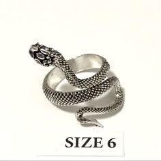 Snake Ring Wrap, Size 6 Silver Tone With Black Highlights Somewhat Sizable Brand New Condition, Please See Pictures For Condition And Details, Thanks. Unisex Ring, Can Be Worn By Men And Women, Same Sizing On Ring Sizes. I Size All My Rings With A Mandrel So Sizes Are Accurate To Us Ring Sizes. Ring Wrap, Black Highlights, Snake Ring, 6 Rings, Unisex Ring, Wrap Rings, Ring Sizes, Womens Jewelry Rings, Black Silver