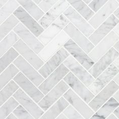 white marble herringbone tile with grey veiners