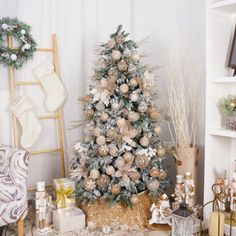 a decorated christmas tree in a living room next to other holiday decorations and decor items