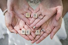 two people holding their hands together with the words i do me it spelled out in scrabble