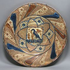 a decorative plate with an image of a bird on it