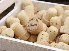 a wooden crate filled with lots of white wine corks