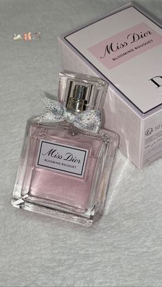 Experience the elegance of Miss Dior Blooming Bouquet, a delicate fragrance that blends floral notes with a hint of citrus, perfect for any occasion. Discover this timeless scent today and add a touch of luxury to your fragrance collection. Disclaimer: I am an Amazon affiliate and may earn a commission from qualifying purchases. Miss Dior Perfume, Perfume Dior, Koleksi Parfum, Dior Miss Dior, Feminine Perfume, Blooming Bouquet, Miss Dior Blooming Bouquet, Dior Girl, Feminine Energy Aesthetic