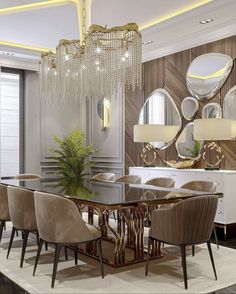 an elegant dining room with chandelier, mirror and table in the centerpiece