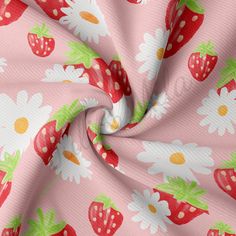 a pink fabric with strawberries and daisies on the bottom, as well as flowers