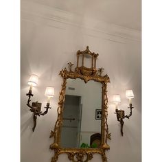 19. Century English gilt mirror in the Chippendale style. Wood gilded frame with foliage trailing the perimeter, a cartouche at the base and a pagoda shelf at the crown. The frame contains the original mirror glass. Gilt Mirror, Glass Mirror, 19th Century, Shelves, Mirror, Wood, Frame, Glass