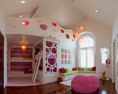 a room with a bunk bed and colorful furniture