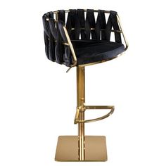 a black velvet and gold metal bar stool