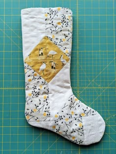 A free quilted Christmas stocking pattern right in time for the holidays! Sew a simple, modern stocking with this step by step tutorial. suzyquilts.com #DIYstocking #quiltedstocking Quilted Xmas Stocking, Free Christmas Stocking Patterns To Sew, Quilted Christmas Stockings Ideas, Diy Quilted Christmas Stocking, Quilted Christmas Stocking Pattern, Stocking Sewing Pattern, Christmas Stockings Pattern, Christmas Stocking Pattern Free, Stocking Pattern Free