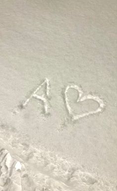 the word i love you written in the snow