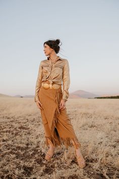 This fringed, flowing skirt pays tribute to Lily’s ties to Nevada. With a touch of Western elegance, it captures the beauty of the landscapes that inspired it. Perfect for cowgirls who blend heritage with high fashion, this skirt moves with you, just like the wind over the Nevada sagebrush. True to Size Little to Medium Stretch Faux Suede Fringe Detailing Ankle Length Skirt Nevada Sagebrush, Ankle Length Skirt, Fringe Skirt, Flowing Skirt, Suede Fringe, Kids Pajamas, The Wind, Jacket Outfits, Nevada