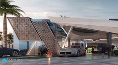 a car dealership with two cars parked in front of it and palm trees around the entrance