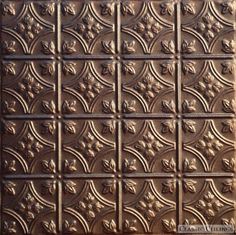 a close up view of an old tin ceiling tile