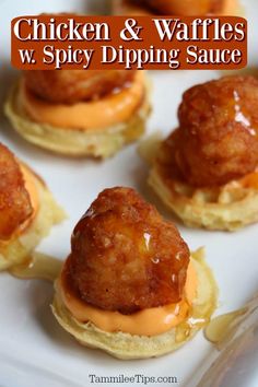 chicken and waffles w spicy dipping sauce on top of mini cheeseburgers