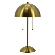 a brass colored lamp on a white background