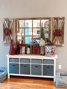 a living room filled with furniture and christmas decorations