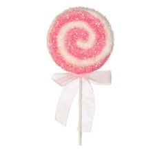 a pink and white lollipop on a stick