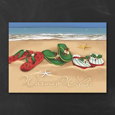 a beach scene with flip flops, starfish and christmas decorations on the sand