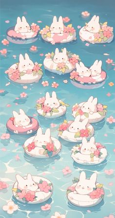 some little bunnies floating in the water with pink flowers on their heads and ears