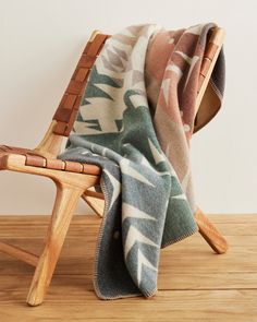 a chair with a blanket on top of it