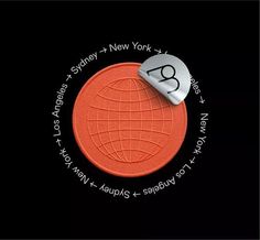 an orange coin with the word new york written on it's front and side