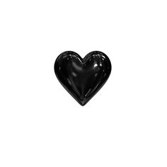 a black heart shaped object on a white background