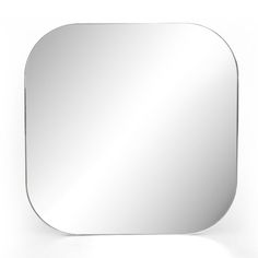 a square shaped mirror on a white background