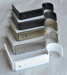 there are many different metal items on the table together, including one for each device