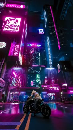 a person on a motorcycle in the middle of a city at night with neon lights