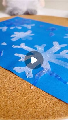 an image of a snowflake made out of paper