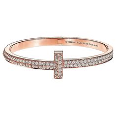 Tiffany and Co. full diamond rose gold iconic T bracelet Medium size bracelet 4.08 carat total weight of fine DEF VVS quality diamonds. It’s a medium to small size wrist 16 to 18mm About the T bracelet Having debuted in 2014, the Tiffany T collection was created by Francesca Amfitheatrof and served as her first collection as a design director for Tiffany & Co. Inspired by the women of New York and the bustling city itself, simplicity was integral to Amfitheatrof's vision. "I wanted to create a s Elegant Bracelet Tiffany & Co., Francesca Amfitheatrof, Tiffany And Co Diamond, T Bracelet, Tiffany Bracelet, Diamond Bracelet Design, Tiffany T, Tiffany Bracelets, Bustling City