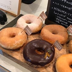 there are many different donuts on the table