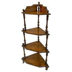 three tiered wooden shelf with two bottles on top