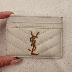 Beautiful Beige Ysl Card Holder With Gold Logo. Used So It Has Some Wear (See Photos). Saint Laurent Card Holder, Ysl Card Holder, Saint Laurent Accessories, Gold Cream, Gold Logo, Cream And Gold, Key Card Holder, Card Holders, Yves Saint Laurent