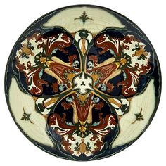 a decorative plate with an intricate design on it