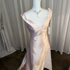 Calvin Klein Pale Pink Off The Shoulder Gown, Size 10, True To Size So Elegant, 40" Long In Front From Shoulder, 58" In Back From Shoulder. New With Tags. No Stains, Rips, Or Tears. Never Worn. Smoke Free, Pet Free Home. Fitted V-neck Feminine Gown, Feminine Fitted V-neck Gown, Feminine V-neck Fitted Gown, Calvin Klein A-line Formal Dresses, Spring Formal Gown With Bias Cut, Feminine Fitted A-line Gown, Fitted A-line Feminine Gown, Calvin Klein V-neck Party Dress, Pink Calvin Klein Party Dress