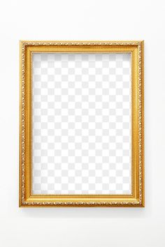 an empty gold frame on a white wall with clipping area for text or image