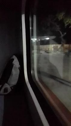 an empty seat on a train at night