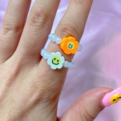 Handmade beaded ring with stretch Beads Ring, Hot Pink Flowers, Light Pink Flowers, Beaded Ring, Flower Lights, Green Flower, Beaded Rings, Orange Flowers, Green Flowers