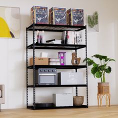 a black shelving unit in a living room